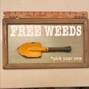Free Weeds Sign with Orange Shovel